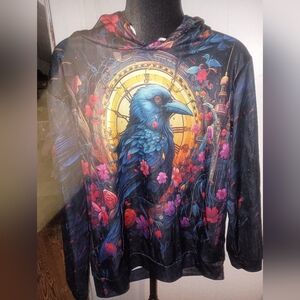 Vibrant Raven Hoodie with Floral Accents